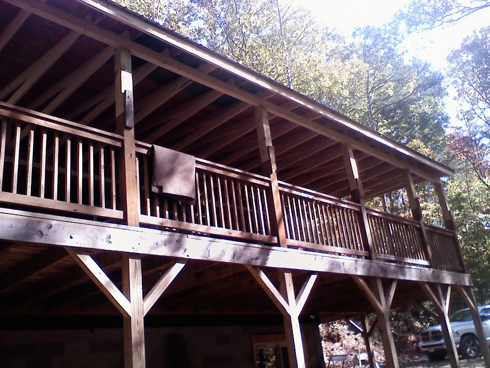 Timber framing under a new elevated porch and deck — Roof Leak Repair in Fulshear by Roofing Brothers